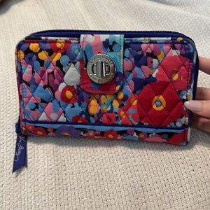 Vera Bradley wallet. Like new. Only used a couple of times.